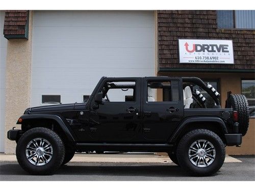 Unlimited sahara 4x4 $10k in upgrades nav dual top lifted 35s pwr boards custom!