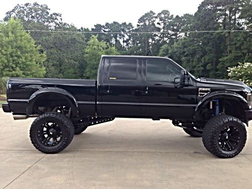 2008 ford f250 blacked out, with 15.5 inch lift