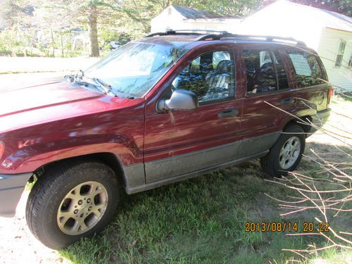 2001 jeep grand cherokee laredo a/c 6 cyl.auto.red,with black leather