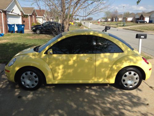 Yellow volkswagen beetle - black leather interior - tinted windows - 50500 miles