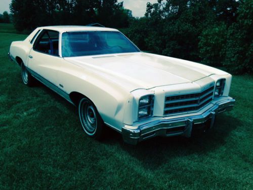 White exterior, blue interior, 2 door. original engine, transmission.