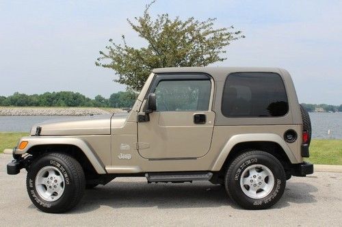 5 speed 4.0l inline 6 sahara ed hard top cold a/c clean no issues we finance