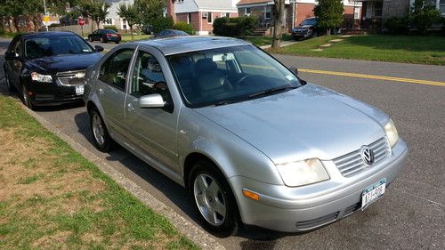 Excellent silver 2002 vw jetta, original owner, leather seats