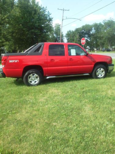 2005  red chevy avalanche truck z71 4wd suv