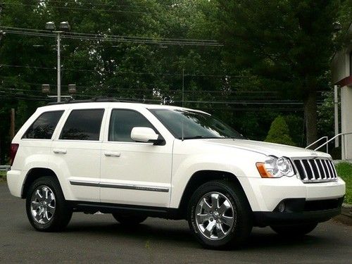 Limited 4x4 hemi nav leather htd seats sunroof bluetooth must see and drive