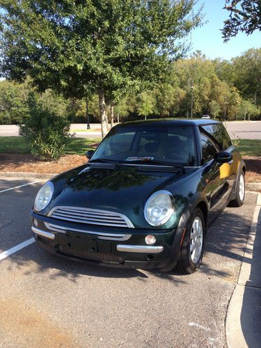 Mini cooper, british green,gas sipper,ice cold a/c,duel moonroof,heated seats