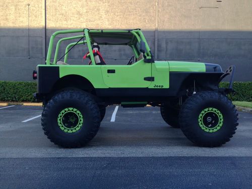 Completely custom 1993 jeep wrangler on 40 inch tires rock crawler