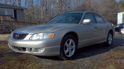 2002 mazda millenia base sedan 4-door 2.5l