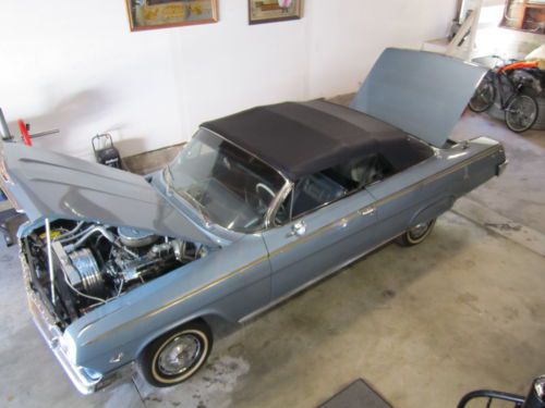 62 impala ss convertible 327 eng,air bags, sound system, factory ac