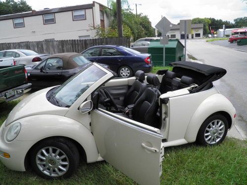 2004 vw beetle convertible, tan, leather, 100k miles, 5 speed., ac