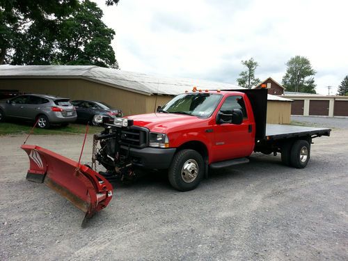 Dually 4x4 flatbed 12' long with 8' to 10' wideout plow strong truck
