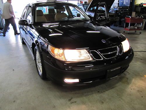 05 saab 9-5 arc auto exel cond,black/taupe low mi 53k padle shift,park asst