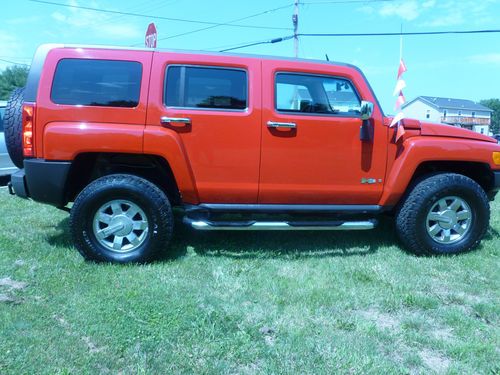 06 bright red hummer h3 75k miles