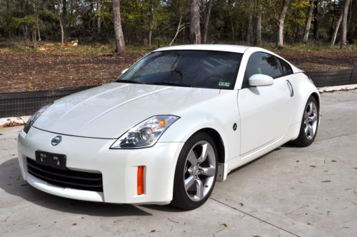 2006 nissan 350z touring pkg coupe, one owner, 6spd,pearl white, 35k miles,immac