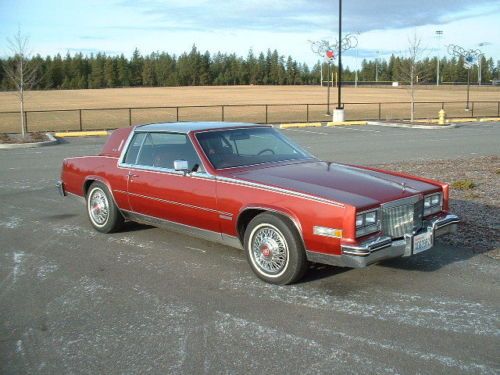83 cadillac eldorado biarritz coupe! stainless roof!  red w/ red leatther!  nice