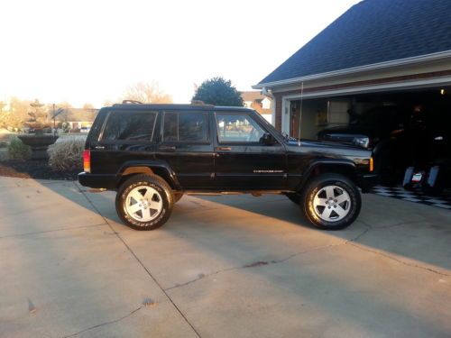 2001 custom lifted jeep cherokee with 18 inch rubicon wheels