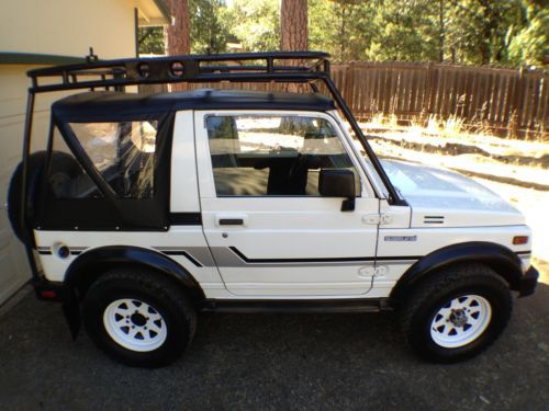 1987  suzuki samurai  (( 100% rust free )) 2nd owner - tow ready safari edition