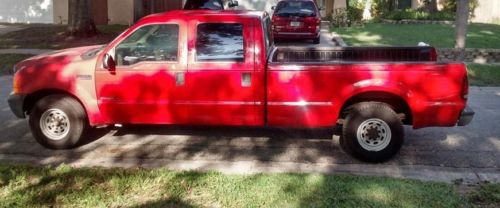 Red 1999 ford f350 diesel, crew cab, long bed