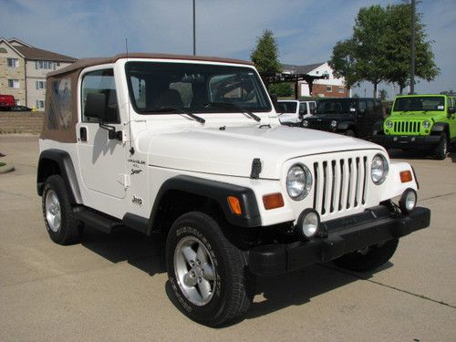 1999 jeep wrangler sport 4 cylinder automatic 4x4 soft top will take trade ship!