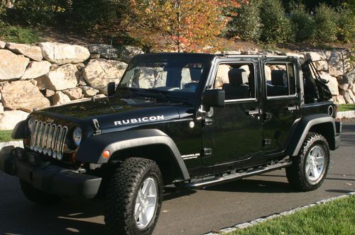 Jeep wrangler jk 4 door rubicon unlimited black waranty included