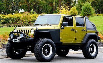 Unlimited low miles rubicon lifted one of a kind sharp 4x4 awd off road clean