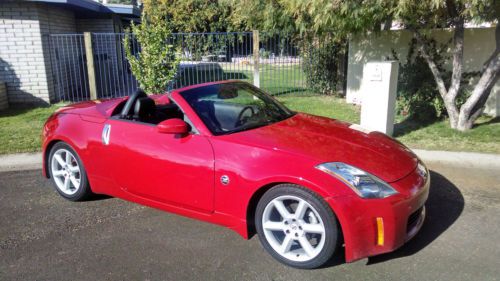 2004 nissan 350z touring convertible 2-door 3.5l roadster with black leather