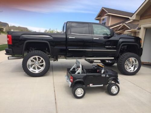 Lifted 2015 gmc denali -- 40 inch toyo mt -- 24 inch american force -- kelderman