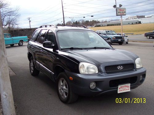 2004 hyundai sante fe 3.5 l black,heated leather, awd