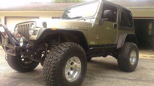 2003 jeep wrangler rubicon 49k clean re lift, pro comp, winch, bumpers, besttop