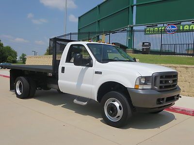 2004 f-450 flate bed with pto  12 foot bed one owner texas own carfax certified
