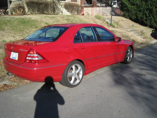 Red sporty with low miles 96,500  sunroof merges well drives great