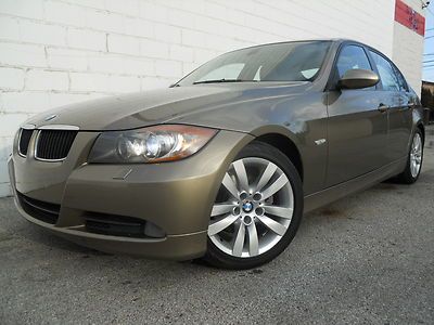 2006 bmw 325i sport package! xenon light! real leather! cold weather package!!
