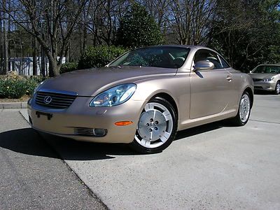 **just traded in a very nice 2005 lexus sc430 hard top convertible**
