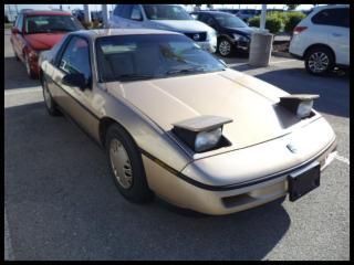 1987 pontiac fiero gold classic 4cyl. great shape great gas  milage collectible