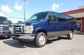 Very nice 2011 model blue ford 10 or 13 pass. van with entertainment system!