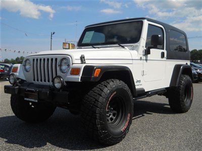 We finance! unlimited 4.0l 4x4 hard top lift kit only 54,000 miles carfax cert!
