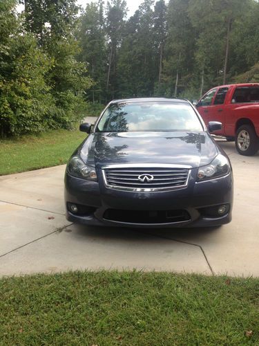 2008 infiniti m35-s.  38,300 miles - mostly highway mi., one owner
