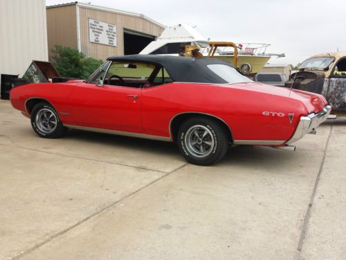 1968 pontiac gto convertible, factory red on red car