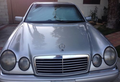 1998 mercedes-benz e300 sedan 4-door 3.0l silver with black interior