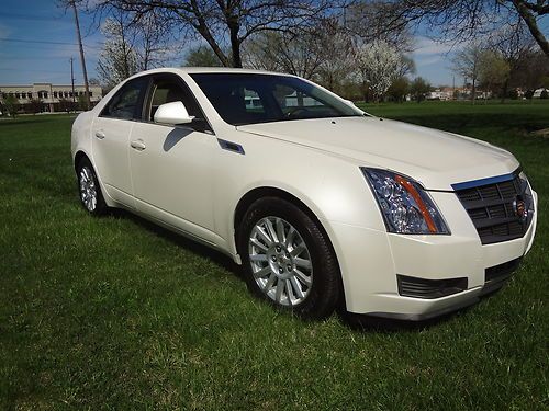 2010 cadillac cts_luxury_3.0_awd_pearl white_htd cld seat_aux_rebuilt_no reserve