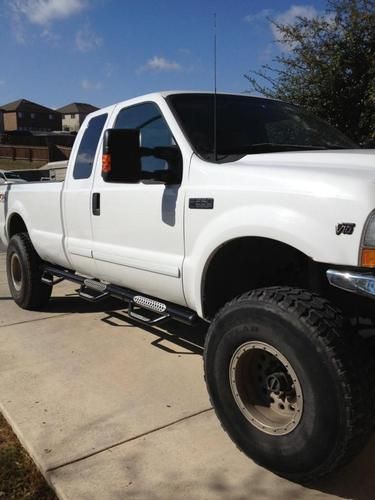 2003 ford f250 super duty v10 fx4 lifted 37" tires