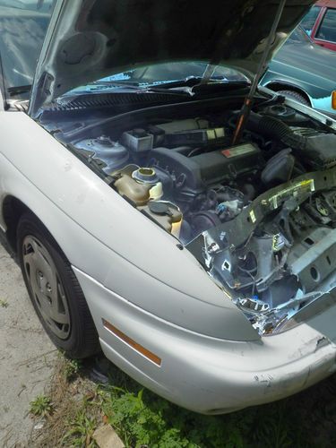 1999 saturn sl2, 4door sedan w/ front damage still runs &amp; drives