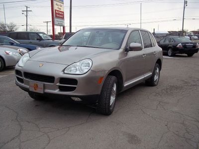 Warranty and financing available! 2004 porsche cayenne awd leather interior