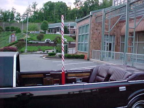 Convertible limo with ""stripper pole"" in it.