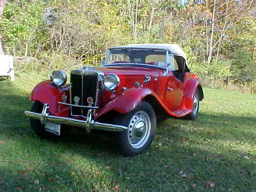 '53 mgtd red, auto tran, nissan engine, great paint.  no hassle driving