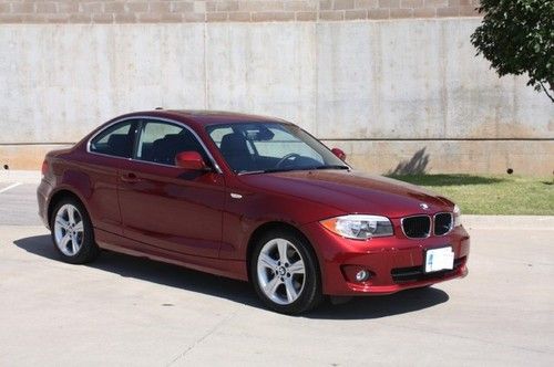 Low miles 6-speed flawless 1 series we finance low reserve