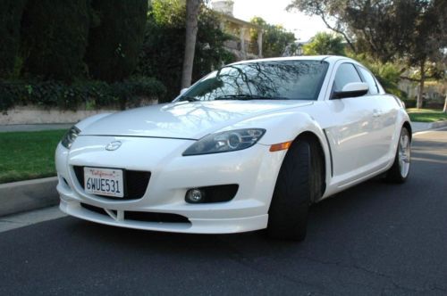 Awesome  mazda rx8 touring manaul 6 speed low miles excellent  trade ?