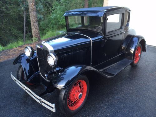 1930 model a ford coupe rumble seat runs great, 64954 miles, like new interior