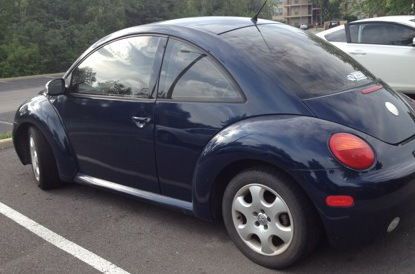 2003 blue new beetle, 84,388 miles.