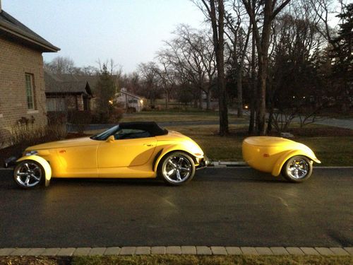 2002 yellow chrysler plymouth prowler with trailer
